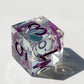 Green liquid core dnd dice with purple font for table games