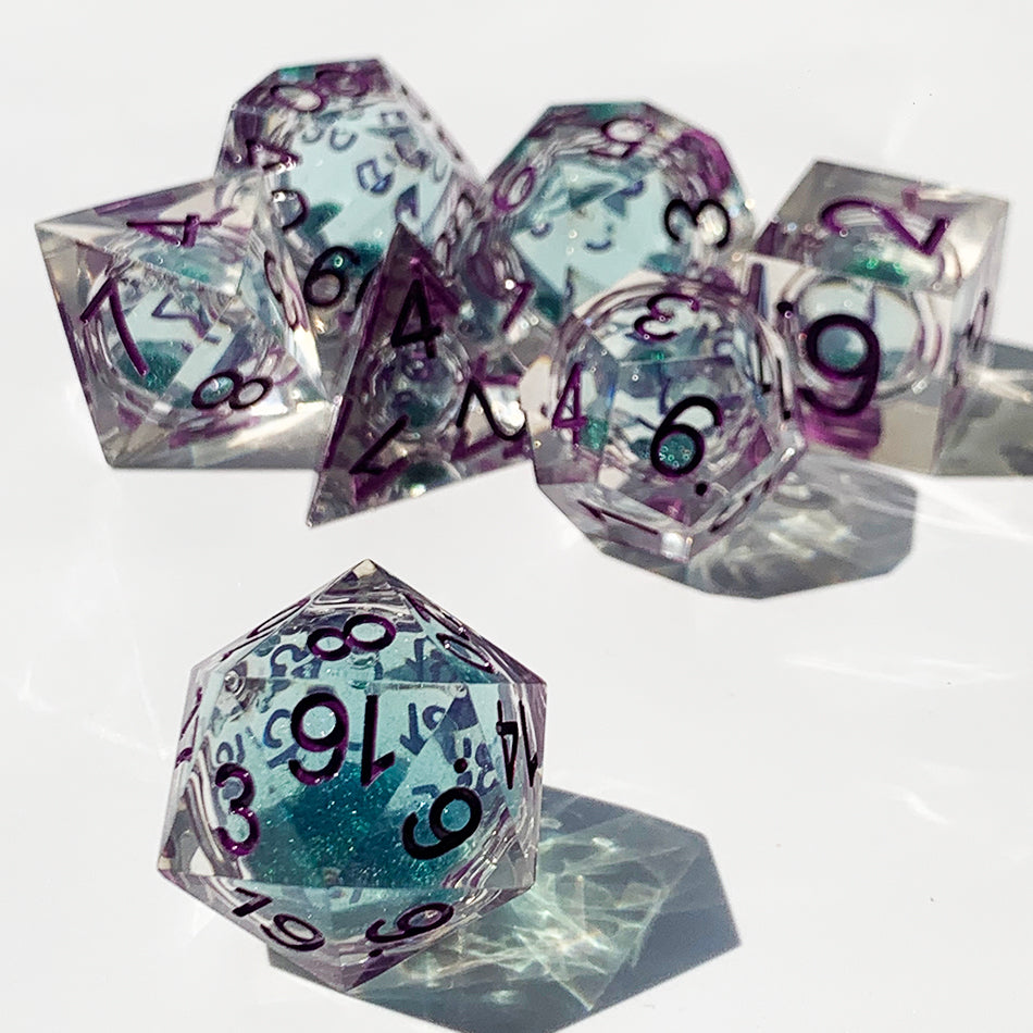 Green liquid core dnd dice with purple font for table games